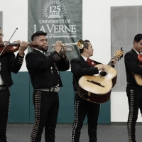 A mariachi band plays at a ULV Debate Team event in the athletic pavillion.