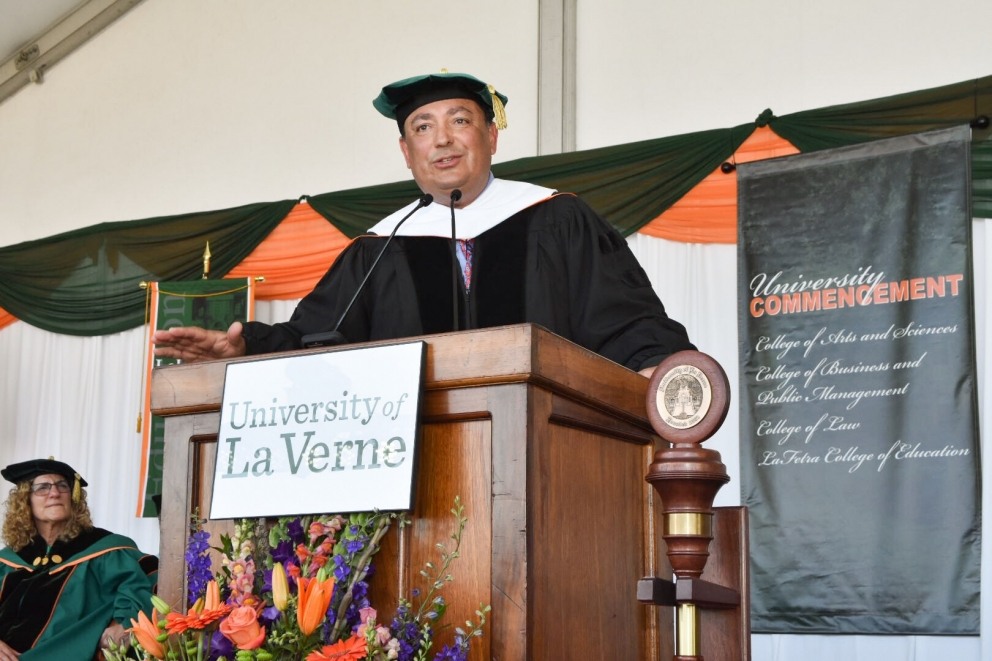 A speaker onstage at the 2018 Commencement Ceremony