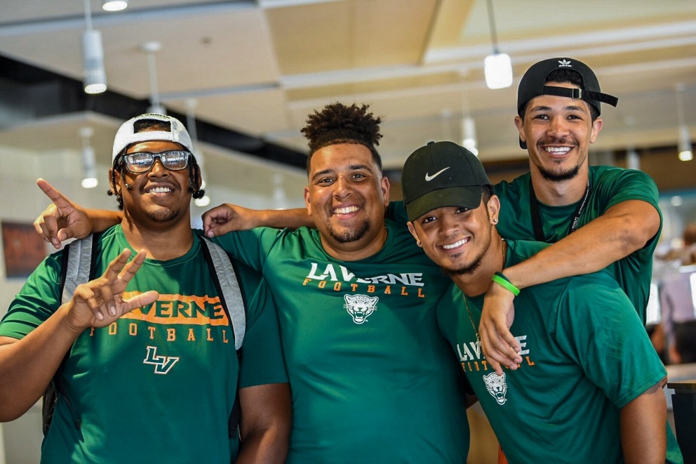 Student smiles on move-in day