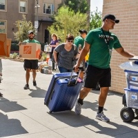 Students move in to their dorms.