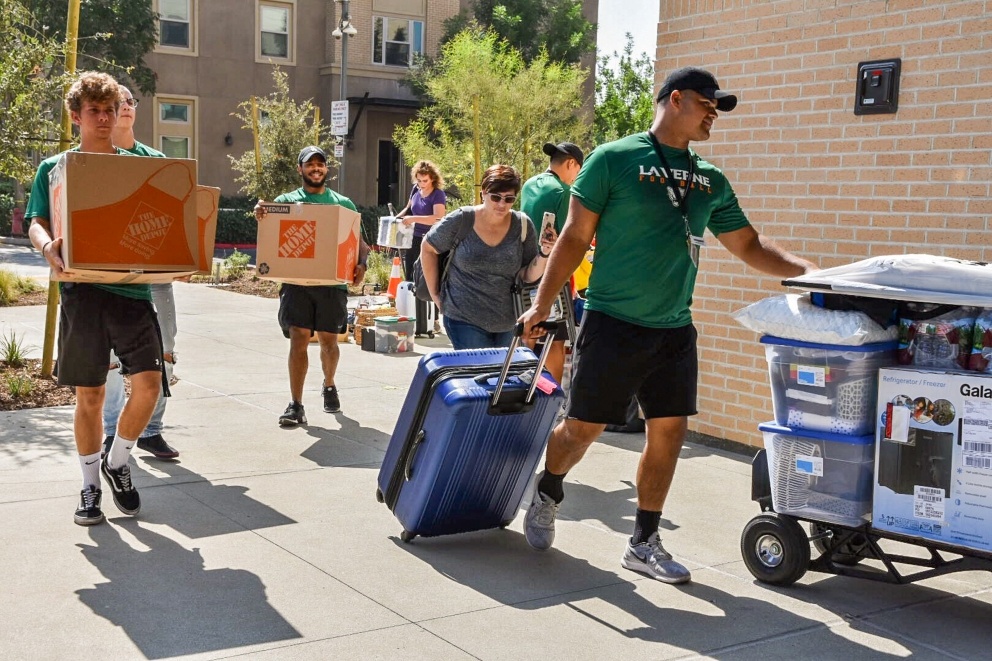 Students move in to their dorms.