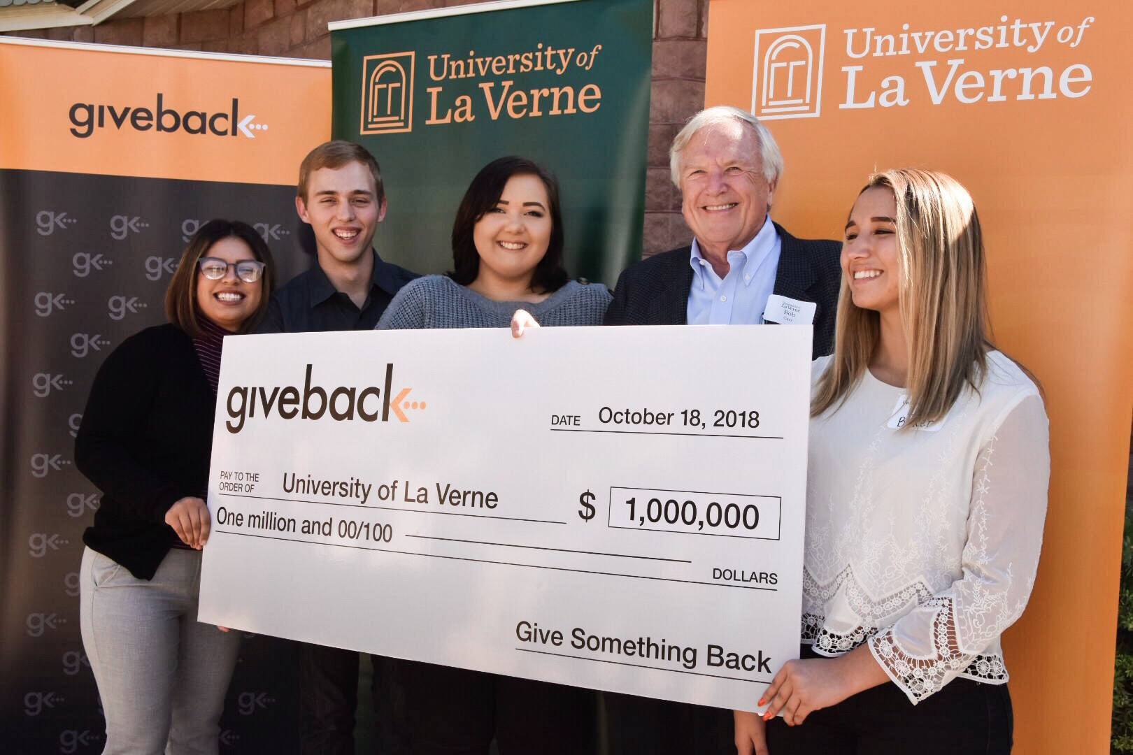 Give Something Back founder Robert Carr with the University of La Verne's first four Give Something Back scholars.