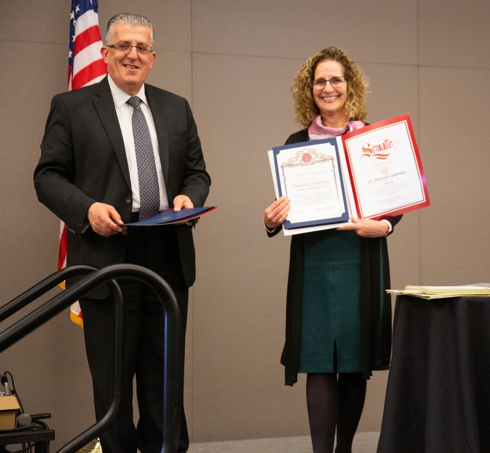 Dean Abe Helou and University President Devorah Lieberman pose for photo