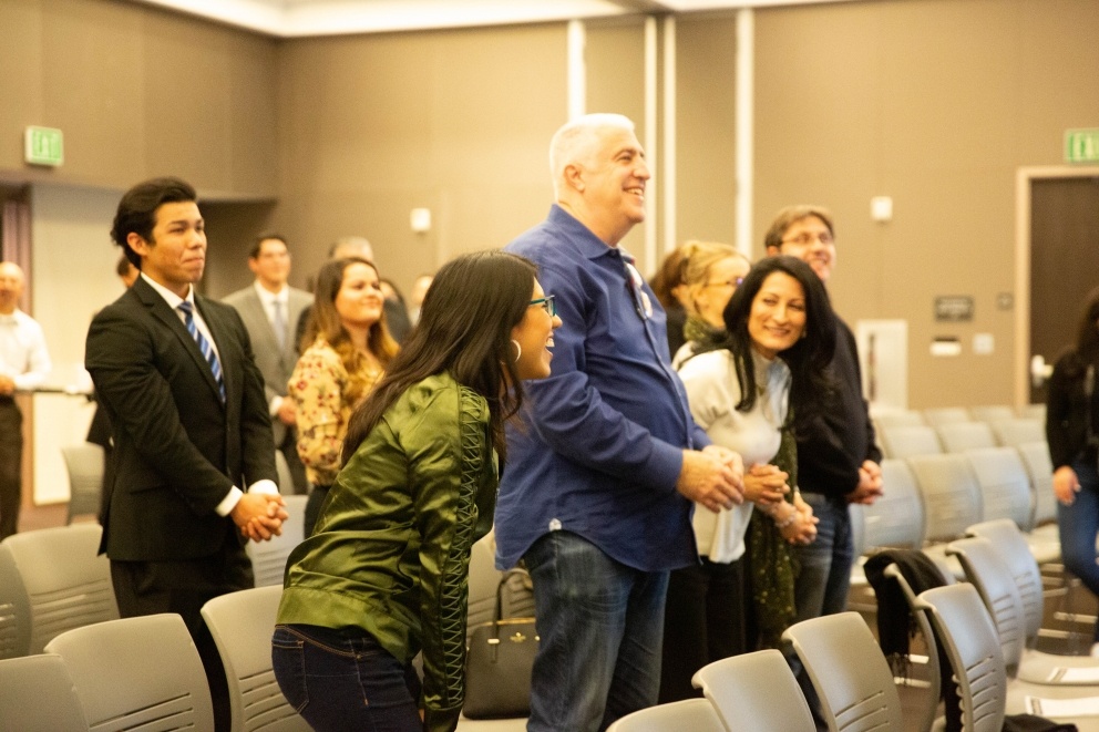 Attendees participate in mixer