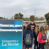 Students gathered at the University of La Verne booth