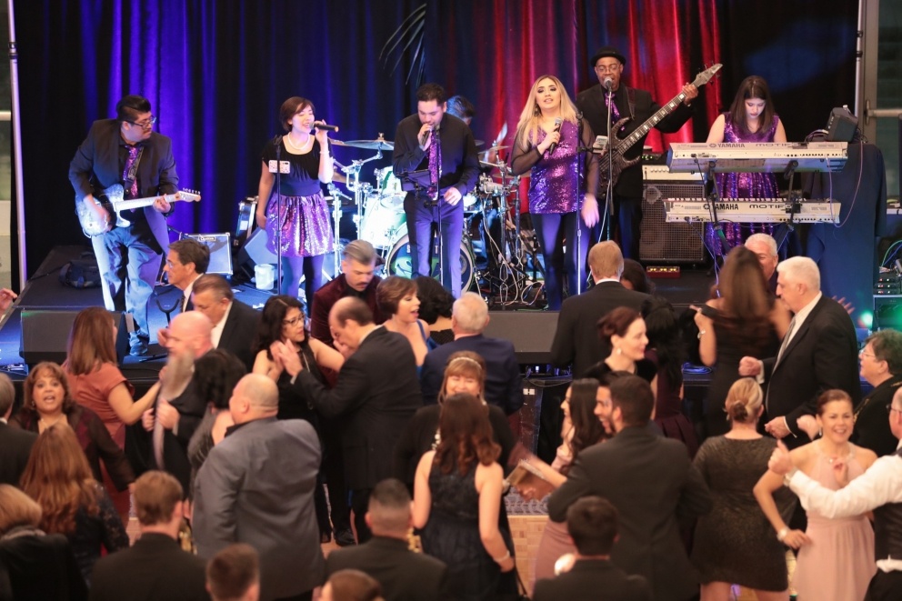 Guests enjoy a live band at the Scholarship Gala.