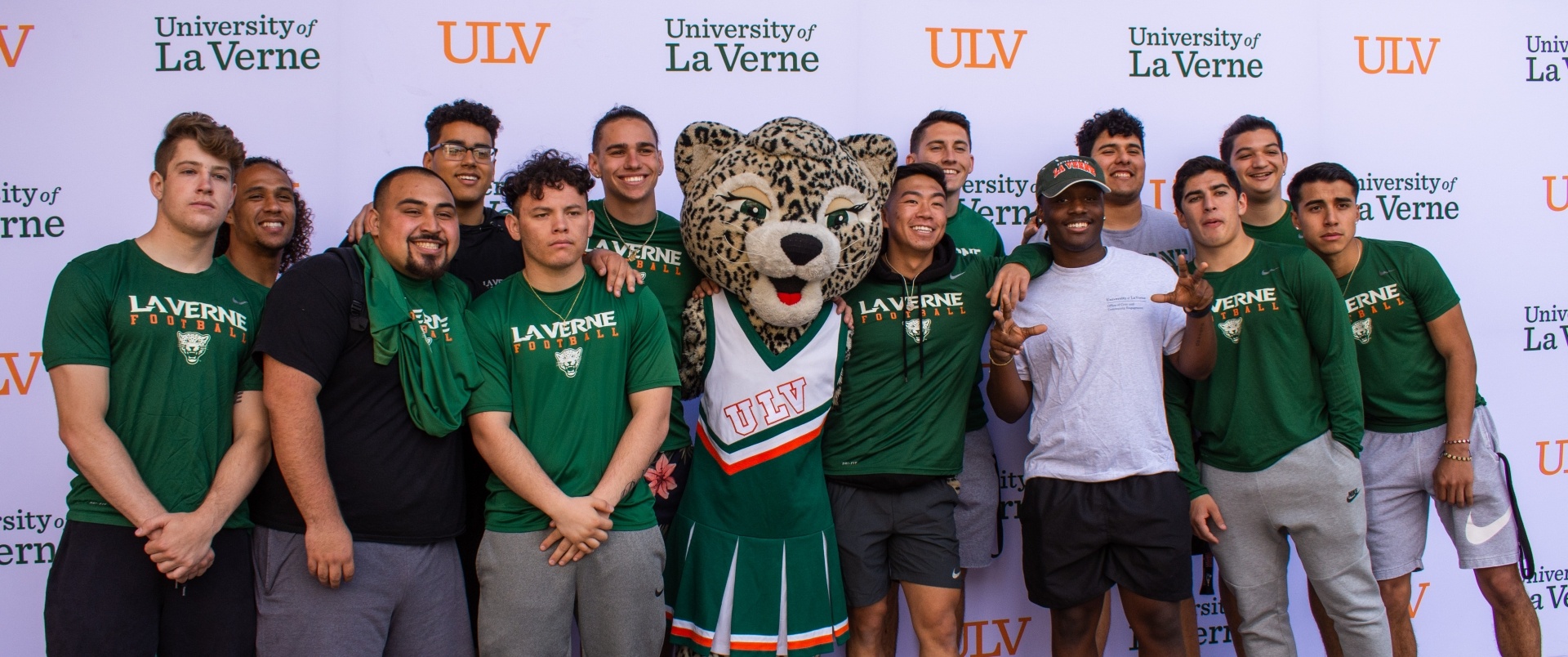 University of La Verne students take a photo with Lea the Leopard