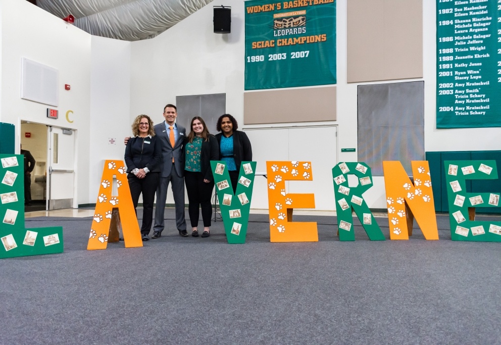 University of La Verne President Devorah Lieberman and Associate Vice President of Enrollment Management and Executive Director of Admission Todd Eckel take a photo with Spotlight student co-chairs Lesly Fuentes and Caroline Zanteson.