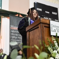 Stduent speaker at graduation.