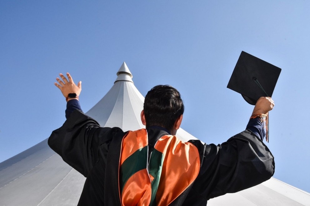 Student looking up to the sky