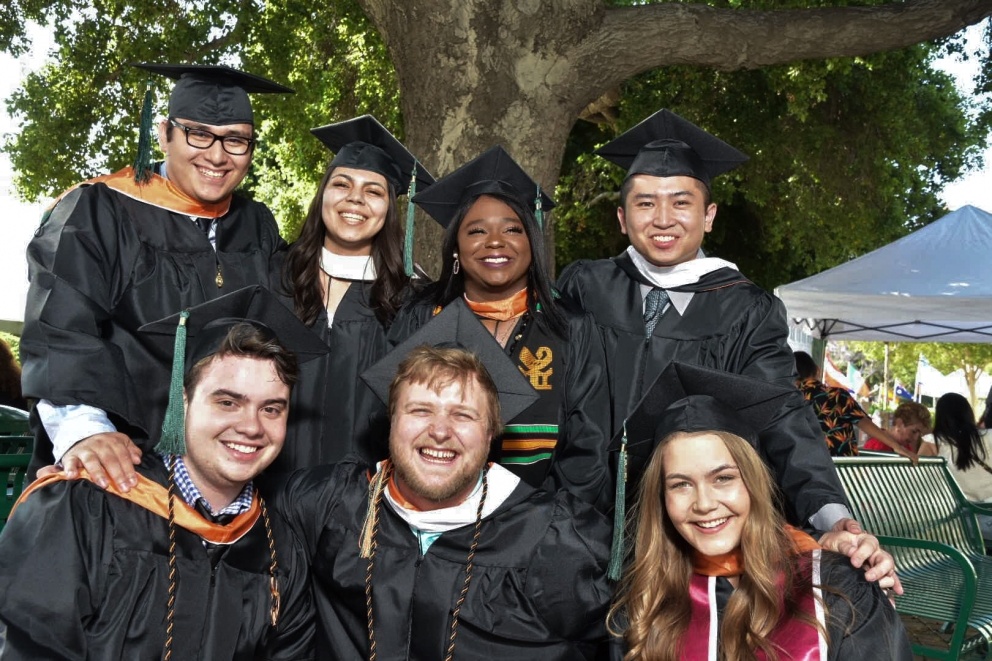 Graduates smiling