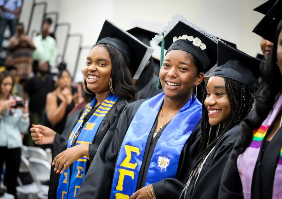 Students smiling at celebration