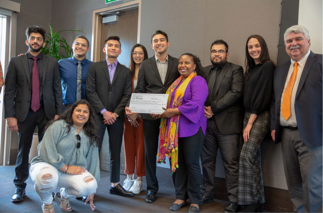 Students present check to charity