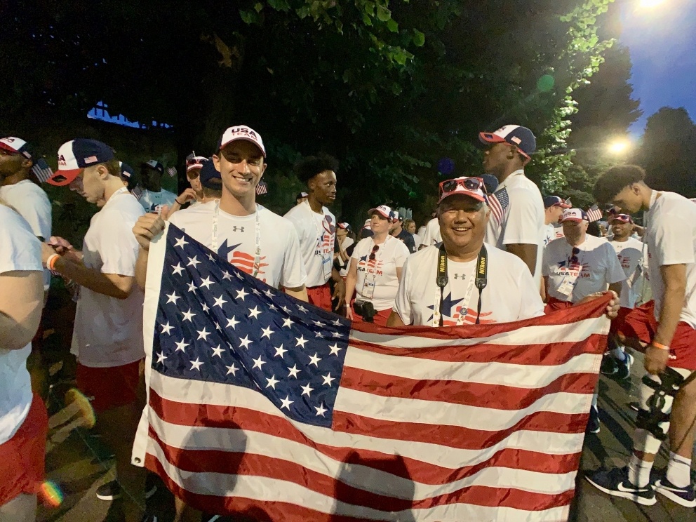 Students holding American flag