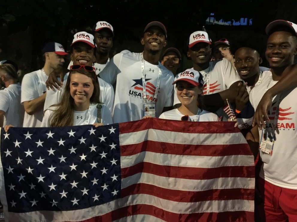 Students holding American flag