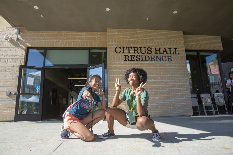Students stand in front of Citrus Hall