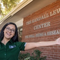 Student in front of Randall Lewis Center