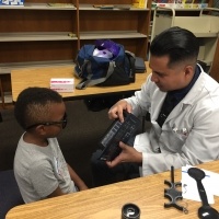 Boy participating in eye test