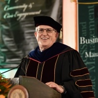 Dean Helou addresses business graduates at first virtual commencement