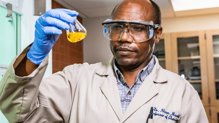 Nixon Mwebi in ULV chemistry lab