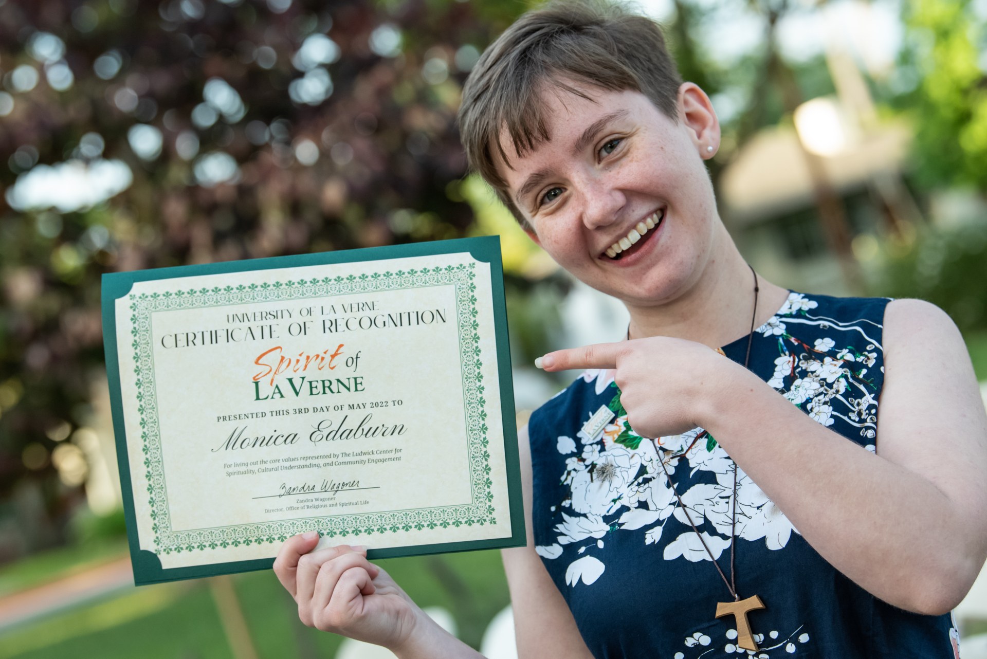 Student Monica Edaburn with her certificate of recognition at the 2022 Spirit of La Verne celebration.