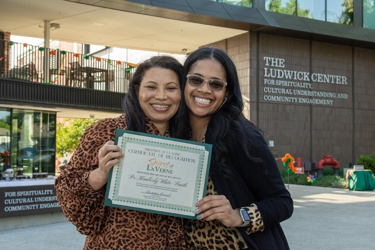 Spirit of La Verne honoree Kimberly White-Smith poses with Alexandra Burrell, chief diversity, equity, and inclusion officer, at the 2022 Spirit of La Verne ceremony.