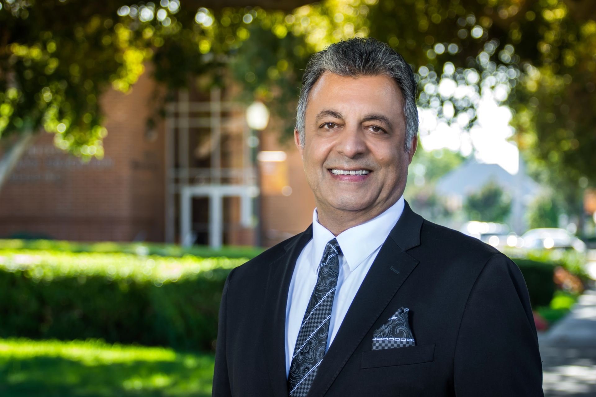 University of La Verne CFO Avo Kechichian in front of Founders Hall