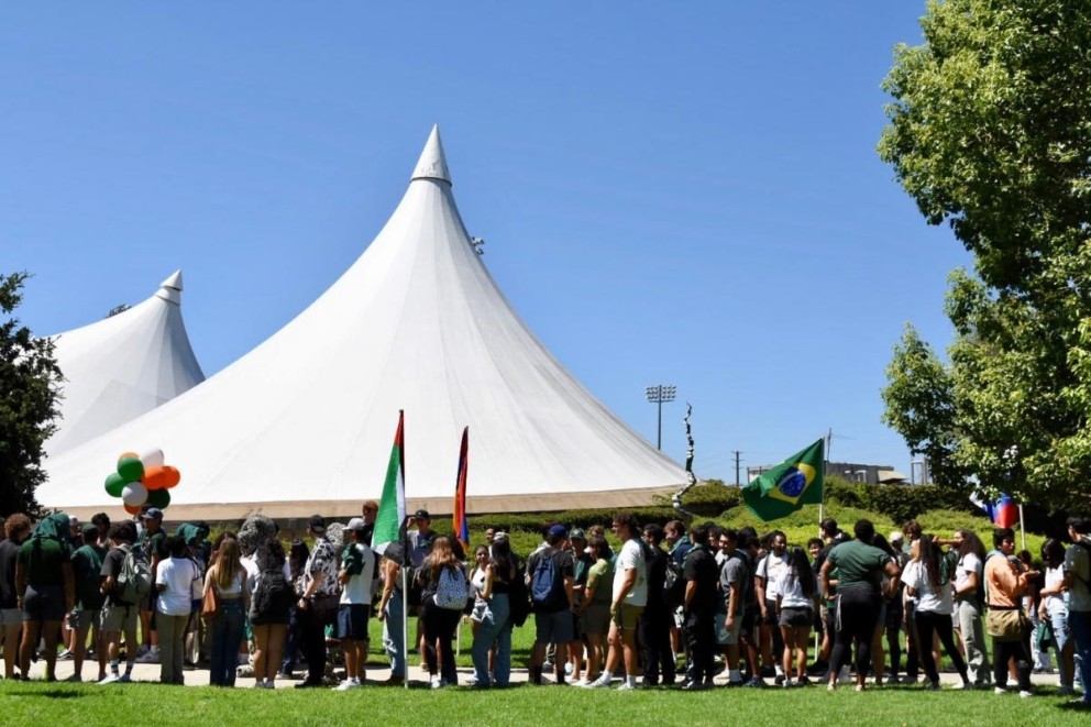 Convocation 2023 - students lining up outside of Tents
