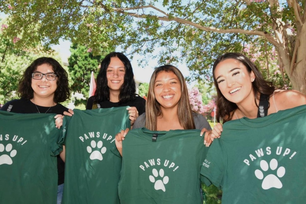 Convocation 2023 - students with paws up tee shirts