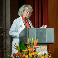2023 White Coat Ceremony Dr. Ann Schultz speaking at podium